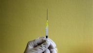 A nurse prepares a H1N1 flu vaccine shot at a hospital in Budapest, Hungary, November 20, 2009. Reuters/Karoly Arvai