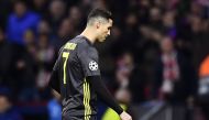 Juventus' Portuguese forward Cristiano Ronaldo reacts during the UEFA Champions League round of 16 first leg football match between Club Atletico de Madrid and Juventus FC at the Wanda Metropolitan stadium in Madrid on February 20, 2019. / AFP / OSCAR DEL