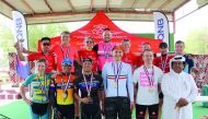 The podium winners of the respective categories pose for a photograph at the end of the fourth race of the six-round Royal Air Maroc League, on Friday.