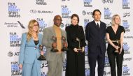 Barry Jenkins (2L) holds the awards for Best Director and Best Feature alongside the cast of 