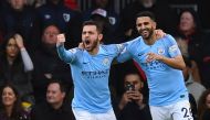 Manchester City's Riyad Mahrez celebrates scoring their first goal with Bernardo Silva REUTERS/Dylan Martinez 