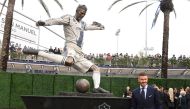 David Beckham pose during unveiling of statue at Legends Plaza at Dignity Health Sports Park. Mandatory Credit: Kirby Lee-USA TODAY Sports