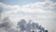 Smoke billows after shelling on the Islamic State (IS) group's last holdout of Baghouz, in the eastern Syrian Deir Ezzor province on March 2, 2019.  AFP / BULENT KILIC