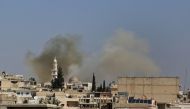 Smoke billows following reported shelling in the town of Khan Sheikhun in the southern countryside of the rebel-held Idlib province, on February 26, 2019. AFP / Anas AL-DYAB