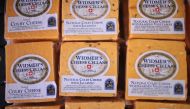 In this file photo taken on June 27, 2016, Colby cheese packages are offered for sale at Widmer's Cheese Cellars in Theresa, Wisconsin.  AFP / Getty Images North America / Scott Olson