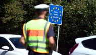 Bavarian Police Officers control cars at a checkpoint on the motorway between the Austrian and German border in Freilassing, Germany, August 27, 2018. Reuters/Michael Dalder