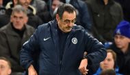 Chelsea's Italian head coach Maurizio Sarri checks his watch during the first leg of the UEFA Europa League round of 16 football match between Chelsea and Dynamo Kiev at Stamford Bridge stadium in London on March 7, 2019. / AFP / Glyn KIRK