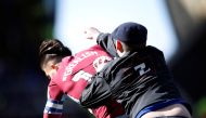 A fan invades the pitch and attacks Aston Villa's Jack Grealish during the match Action Images via Reuters/Carl Recine