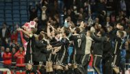 Players of Ajax celebrate after winning UEFA Champions League Round of 16-second leg match against Real Madrid at Santiago Bernabeu Stadium in Madrid, Spain on 5, 2019. Burak Akbulut - Anadolu