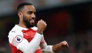 FILE PHOTO:  In this file photo taken on February 27, 2019 Arsenal's French striker Alexandre Lacazette celebrates scoring his team's fifth goal during the English Premier League football match between Arsenal and Bournemouth at the Emirates Stadium in Lo