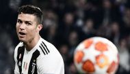 Juventus' Portuguese forward Cristiano Ronaldo eyes the ball during the UEFA Champions League round of 16 second-leg football match Juventus vs Atletico Madrid on March 12, 2019 at the Juventus stadium in Turin. AFP / Marco Bertorello 