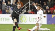 Washington, DC, USA; D.C. United forward Wayne Rooney (9) shoots the ball as Real Salt Lake midfielder Kyle Beckerman (5) defends in the second half at Audi Field. D.C. United won 5-0. Geoff Burke