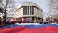 FILE PHOTO: People take part in celebrations of the fifth anniversary of Russia's annexation of Crimea in Simferopol, Crimea March 15, 2019. REUTERS/Alexey Pavlishak