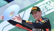Red Bull's Max Verstappen holds the third place trophy after the Formula One F1 Australian Grand Prix at the Albert Park Grand Prix Circuit in Melbourne, Australia, March 17, 2019. AAP/Julian Smith