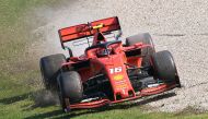Ferrari's Monegasque driver Charles Leclerc runs off the track during the Formula One Australian Grand Prix in Melbourne on March 17, 2019. AFP / WILLIAM WEST