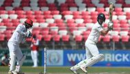 Ireland's Andy Balbirnie plays a shot during the third day of the Test cricket match between Afghanistan and Ireland at the Rajiv Gandhi International Cricket Stadium in the northern Indian city of Dehradun on March 17, 2019. (AFP / Money SHARMA)