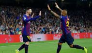 Barcelona's Lionel Messi celebrates scoring their first goal with Arturo Vidal REUTERS/Marcelo del Pozo