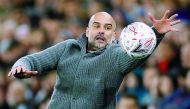 Manchester City manager Pep Guardiola with the match ball, Liberty Stadium, Swansea, Britain - March 16, 2019 (Action Images via Reuters/John Sibley)
