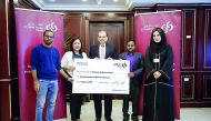 The winners with the Commercial Bank officials.