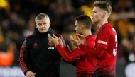 Manchester United interim manager Ole Gunnar Solskjaer looks dejected after the match with Scott McTominay and Andreas Pereira REUTERS/Andrew Yates