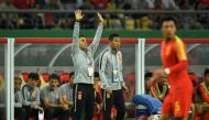 China's new head coach Fabio Cannavaro (L) gestures during the 2019 China Cup football match between China and Thailand in Nanning, in China's southern Guangxi region, on March 21, 2019. China OUT / AFP / STR