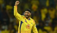 Chennai Super Kings cricketer Harbhajan Singh celebrates a wicket of Royal Challengers Bangalore's Virat Kohli during the Indian Premier League (IPL) Twenty20 cricket match between Chennai Super Kings and Royal Challengers Bangalore at the M. A. Chidhamba