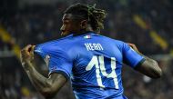 Italy's forward Moise Kean celebrates after scoring during the Euro 2020 Group J qualifying football match between Italy and Finland on March 23, 2019 at the Friuli stadium in Udine. / AFP / Andreas SOLARO
