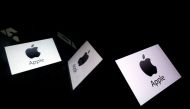 In this file photo taken on February 16, 2019 this illustration picture shows the US multinational technology company Apple logo displayed on a tablet in Paris. AFP / Lionel Bonaventure 