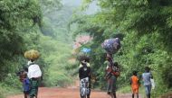 Displaced people return to their village in the western Tai area near the border with Liberia, June 17, 2012. Reuters/Luc Gnago