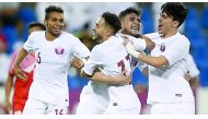 Qatari players celebrate after qualifying for the AFC U-23 Championship Thailand 2020 with a two-all draw against Oman at the Aspire Pitch in Doha, yesterday.