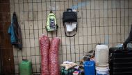 Groceries and other goods stand ready on the side of the road in central Johannesburg to be transported across the border to Zimbabwe by oMalayitsha on February 20, 2019. AFP / Gulshan Khan 
