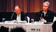 Seiichiro Nishioka (L) and Sadayuki Sakakibara (R), co-chairs for Nissan's special committee for improving governance, attend a Nissan Motor press conference in Yokohama on March 27, 2019.  AFP / Charly Triballeau
 