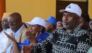 Incumbent Comoros President Azali Assoumani greets supporters in Moroni on March 27, 2019 during celebrations for his re-election.  AFP / Youssouf IBRAHIM
