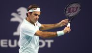 File photo of Roger Federer of Switzerland in action against Kevin Anderson of South Africa during day eleven of the Miami Open tennis on March 28, 2019 in Miami Gardens, Florida. Julian Finney/Getty Images/AFP