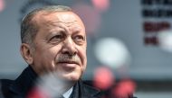 Turkish President Recep Tayyip Erdogan greets his supporters after his speech during a pre-election rally at Bayrampasa district in Istanbul, on March 30, 2019.  / AFP / Ozan KOSE 