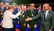 German Chancellor Angela Merkel greets guests as she arrives to the opening ceremony of the Hanover Fair on March 31, 2019 in Hanover, Germany. The Hanover technology fair runs until April 05, 2019, with Sweden as partner country. AFP / DPA / Friso Gentsc