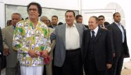 Libyan leader Moamer Kadhafi (L) with his counterparts from Egypt, Hosni Mubarak (C), and Algeria, Abdelaziz Bouteflika, after their meeting in Sirte on the Mediterranean coast east of Tripoli on August 15, 2005. AFP 