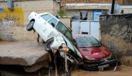 FILE PHOTO: Damaged vehicles are seen after a flash flooding in Shiraz, Iran, March 26, 2019. 