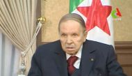 Algeria's President Abdelaziz Bouteflika looks on during a meeting with army Chief of Staff Lieutenant General Gaid Salah in Algiers, Algeria, in this handout still image taken from TV. Algerian TV /Handout via Reuters 