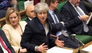 A handout photograph taken and released by the UK Parliament on April 3, 2019 shows Britain's Prime Minister Theresa May attending the weekly Prime Minister's Questions (PMQs) question and answer session in the House of Commons in London. AFP PHOTO /MARK 
