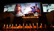 Dozens of Ethiopian and Eritrean living in Addis Ababa gather for the memorial service to honor Eritrean American rapper, Nipsey Hussle, on April 6, 2019 in Addis Ababa.  AFP / Michael TEWELDE