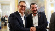 FILE PHOTO: Italian Deputy Prime Minister Matteo Salvini and Austrian Vice-Chancellor Heinz-Christian Strache shake hands before a joint news conference in Vienna, Austria, September 14, 2018. REUTERS/Leonhard Foeger/File Photo