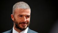 Former football player David Beckham visits the VinFast stand during the first press day of the Paris auto show in France, October 2, 2018. Reuters/Regis Duvignau