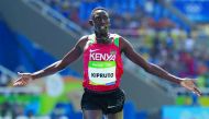 Kenya’s Conseslus Kipruto celebrates after winning the Men’s 3000m Steeplechase Final during the athletics event at the Rio 2016 Olympic Games at the Olympic Stadium in Rio de Janeiro in this August 17, 2016 file picture.  