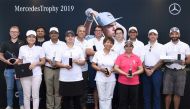 The winning golfers pose for a photograph following the presentation ceremony of the The fourth Mercedes Trophy Golf Tournament, organised by Nasser Bin Khaled Automobiles, at Education City Golf Club.