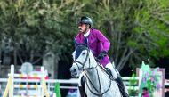 Qatari rider Jaber Rashid Al Amri rides  Canavaro De Muze E.T. during the Medium Tour competition on the opening day of the penultimate round of the Hathab Equestrian Tour - 2019, at the Qatar Equestrian Federation’s Arena, yesterday. 