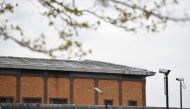Belmarsh prison is seen behind its walls in south-east London on April 12, 2019.   AFP / Daniel LEAL-OLIVAS
