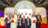 Officials and dignitaries with previous year’s winners.