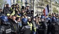 Yellow vests (Gilets jaunes) protesters gather on the Place de la Republique during the 'Act 22’ demonstration (the 22nd consecutive Saturday national protest) in Paris, France on April 13, 2019. Mustafa Yalç?n - Anadolu
