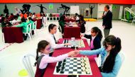 Junior players taking part in the Qatar Primary Schools Chess Tournament for girls, at the Jawaan Bin Jassim Model Independent School for Boys, yesterday.